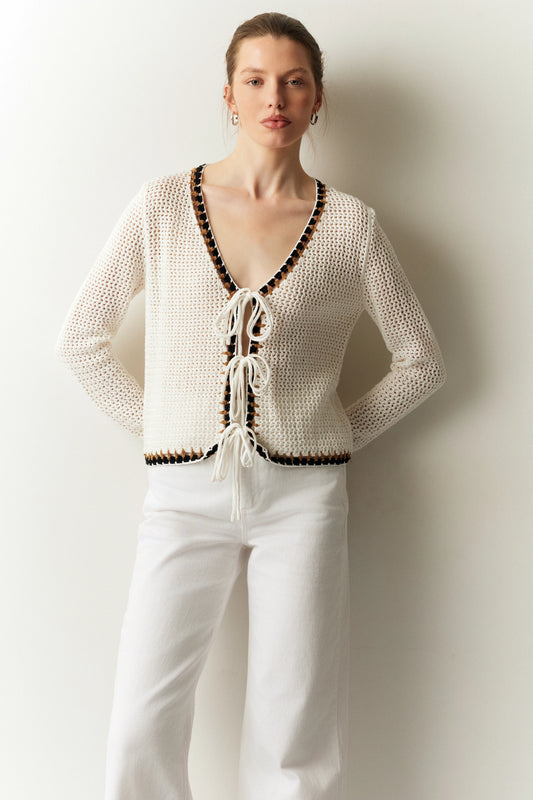 Knitted cardigan with self tie